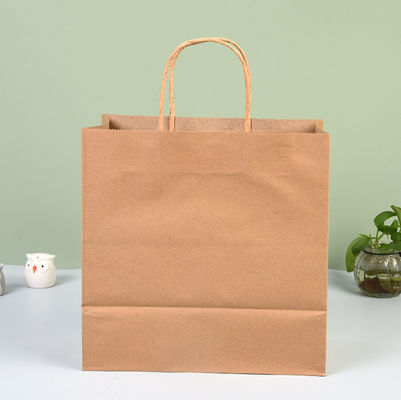 O produto comestível leva embora os sacos de papel brancos do cartão dos sacos de compras do papel de embalagem